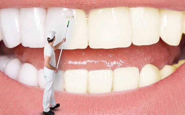 راه های سفید کردن دندان با جوش شیرین در خانه